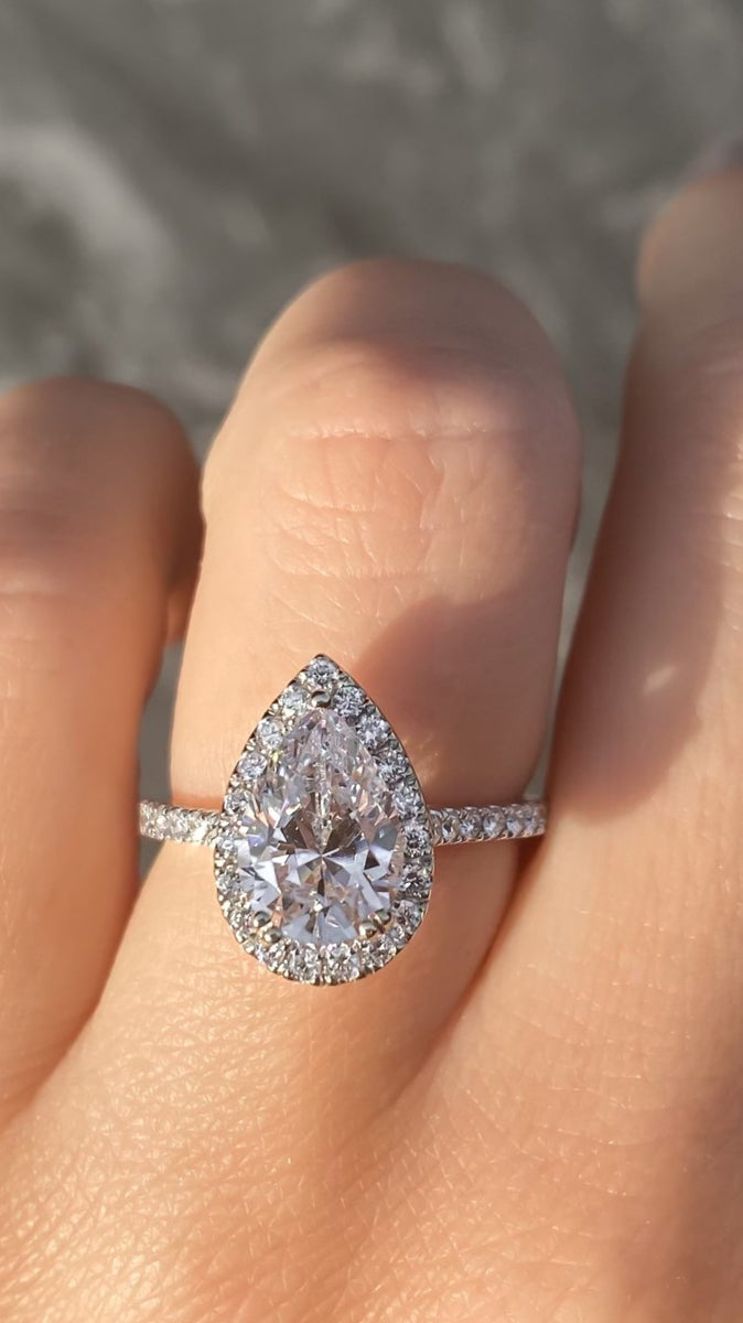 Pear shaped diamond ring with halo Clearance