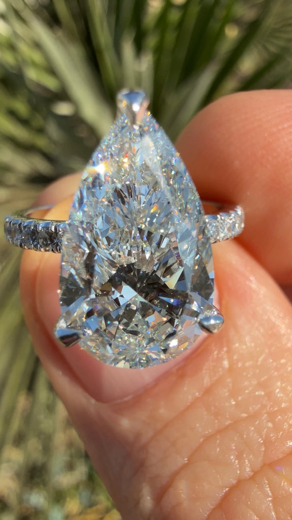 4 Carat Pear Diamond Engagement Ring with a Hidden Halo