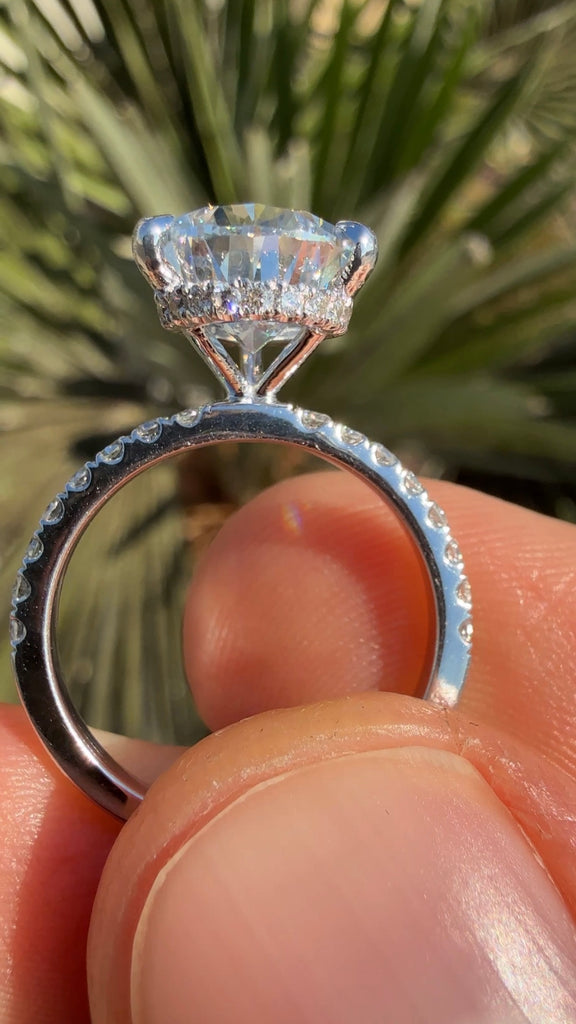 4 Carat Pear Diamond Engagement Ring with a Hidden Halo