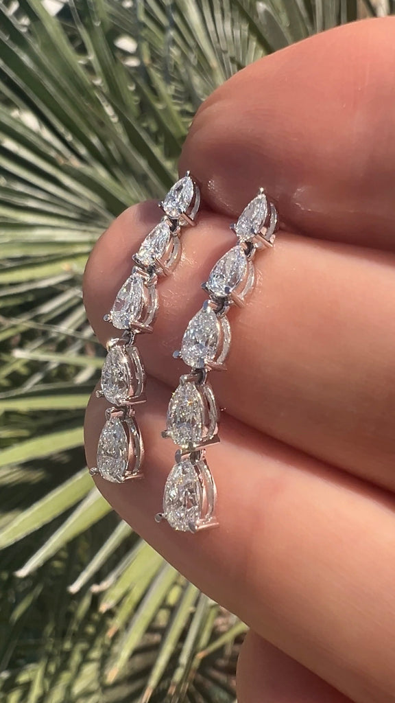 Graduating Pear Shape Diamond Dangling Earrings