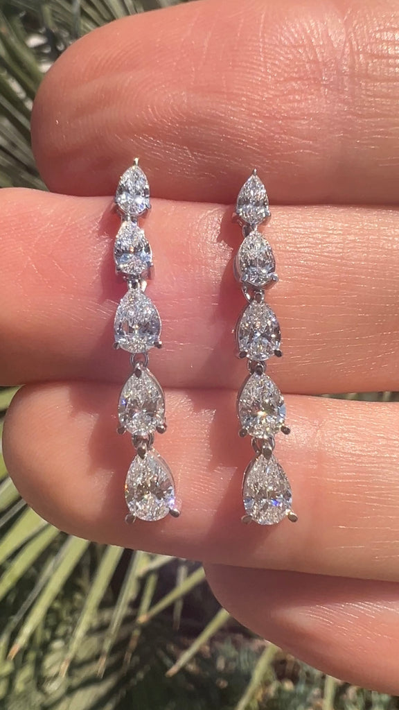 Graduating Pear Shape Diamond Dangling Earrings