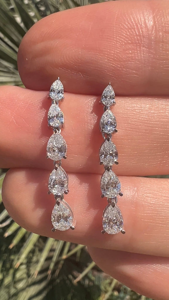 Graduating Pear Shape Diamond Dangling Earrings