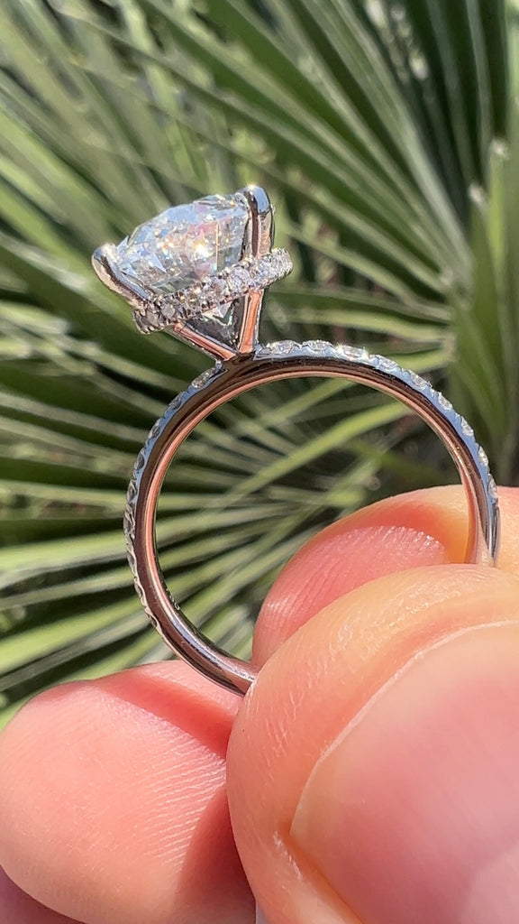 Oval Diamond Engagement Ring with Under Halo of Diamonds